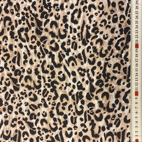 Stretch Black White Snow Leopard Skin Animal Lycra Fabric - 1m