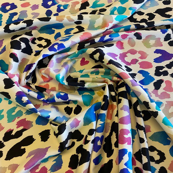 Rainbow & Black on White Leopard Lycra Fabric - 1m