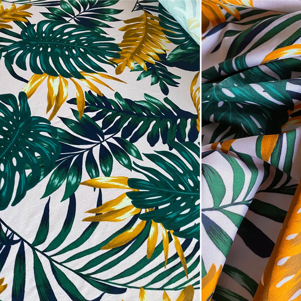 Green, Orange and Navy Fern Leaf print on Cream Tropical Lycra Fabric - 1m