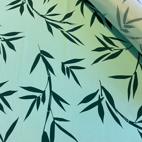 Dark Green Bamboo Leaf on Turquoise Print Lycra Fabric - 1m