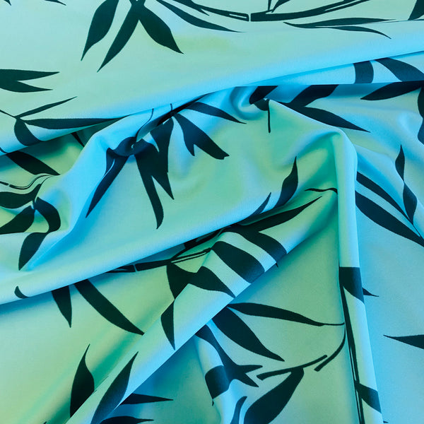 Dark Green Bamboo Leaf on Turquoise Print Lycra Fabric - 1m