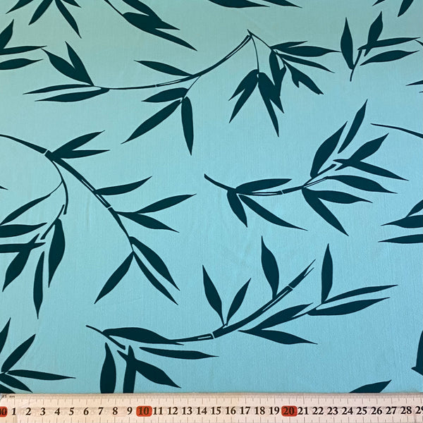 Dark Green Bamboo Leaf on Turquoise Print Lycra Fabric - 1m