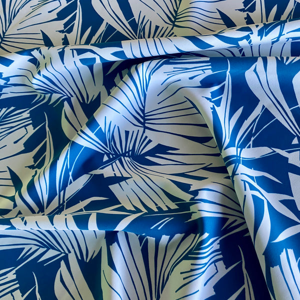 Tissu Lycra Tropical Imprimé Feuilles de Fougère Jaune Soleil et Bleu Pétrole - 1m